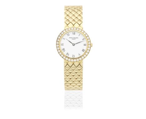 Patek Philippe. A lady's 18K gold diamond set quartz bracelet watchModel: CalatravaReference: 4820/1Date: Circa 2000Movement:
