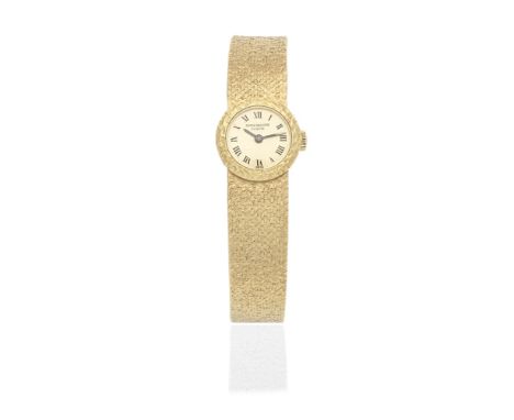 Patek Philippe. A lady's 18K gold manual wind bracelet watchReference: 3266/152Date: Circa 1970Movement: 20-jewel manual wind