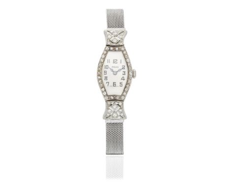 Rolex. An 18K white gold manual wind cocktail watchDate: Circa 1930Movement: 15-jewel manual windDial: Silvered, black Arabic
