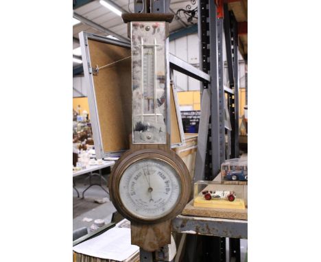 A VINTAGE BAROMETER AND THERMOMETER WITH A MIRRORED NECK