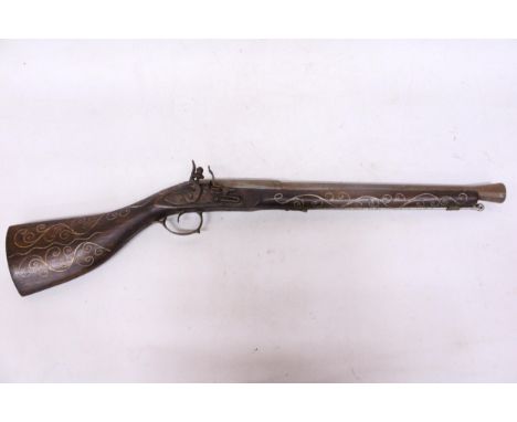 A VINTAGE NON FIRING INDIAN FLINTLOCK BLUNDERBUS 44CM BARREL LENGTH 76CM