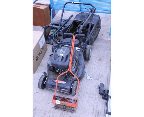 A LAWN KING PETROL LAWN MOWER AND A VINTAGE AERATOR