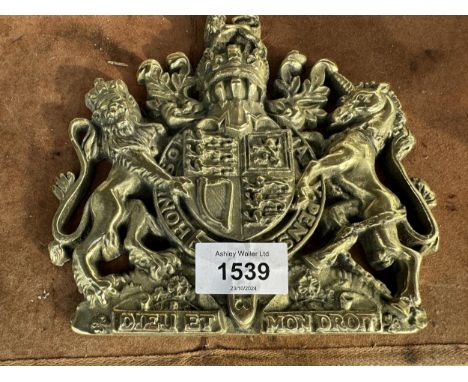 A VINTAGE BRASS PLAQUE OFF A SAFE