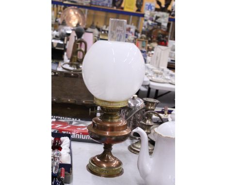 A VINTAGE COPPER AND BRASS OIL LAMP WITH OPAQUE GLASS SHADE, HEIGHT APPROX 45CM