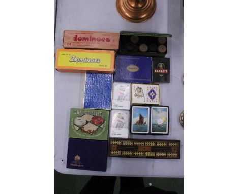 A COLLECTION OF VINTAGE GAMES TO INCLUDE DRAUGHTS, CARDS, CRIBBAGE BOARD, CARDS, ETC.,