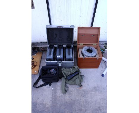 AN ASSORTMENT OF ITEMS TO INCLUDE THREE KODAK CAROUSEL PROJECTORS, A CAMERA LENS AND A CAMCORDER ETC