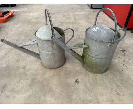 TWO VINTAGE GALVANISED WATERING CANS