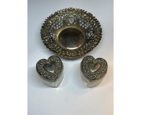 THREE HALLMARKED SILVER ITEMS TO INCLUDE A CHESTER PIERCED PIN DISH AND TWO BIRMINGHAM TOPPED HEART SHAPED POTS