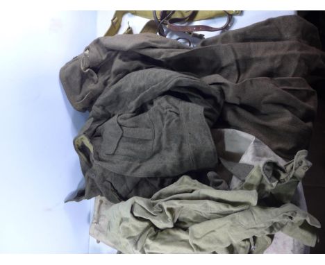 A KIT BAG CONTAINING WORLD WAR II BRITISH ARMY UNIFORMS, BELTS ETC