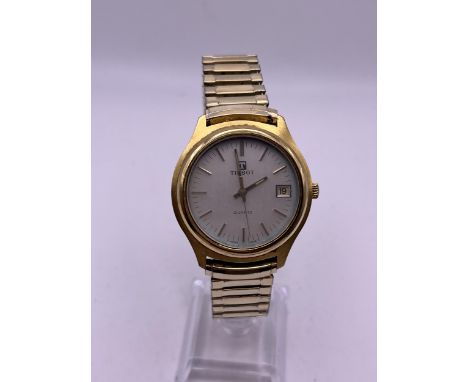 A GENTLEMAN'S VINTAGE TISSOT GOLD PLATED WRIST WATCH