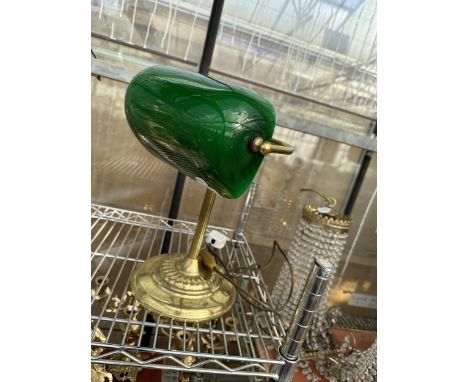 A BRASS BANKERS LAMP WITH GREEN GLASS SHADE