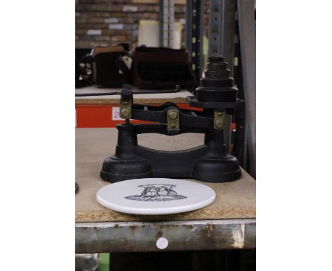 A SET OF VINTAGE CAST SCALES WITH AN UNUSUAL CERAMIC PLATE INSTEAD OF A PAN, PLUS WEIGHTS