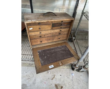 A SMALL JOINERS TOOL CHEST WITH TOOLS