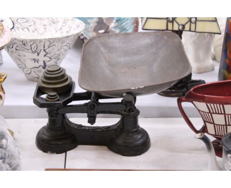 A SET OF CAST SCALES WITH PAN AND WEIGHTS