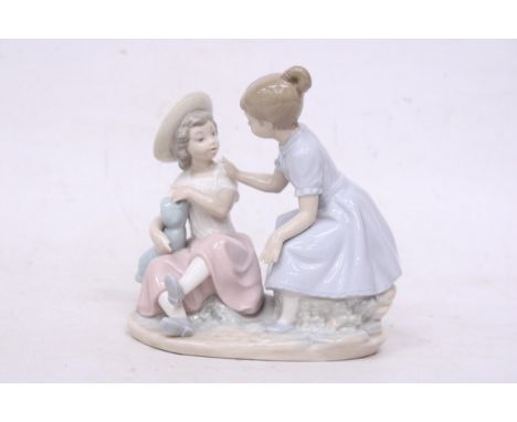 A NAO FIGURINE "IT'S MY DOLL"