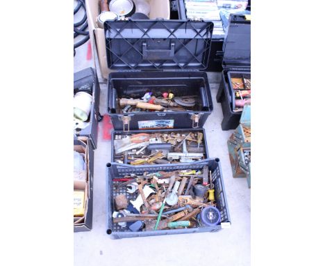 A TOOL BOX AND AN ASSORTMENT OF TOOLS TO INCLUDE SPANNERS AND CHISLES ETC