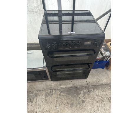 A HOTPOINT DOUBLE OVEN AND GRILL WITH CERAMIC HOB