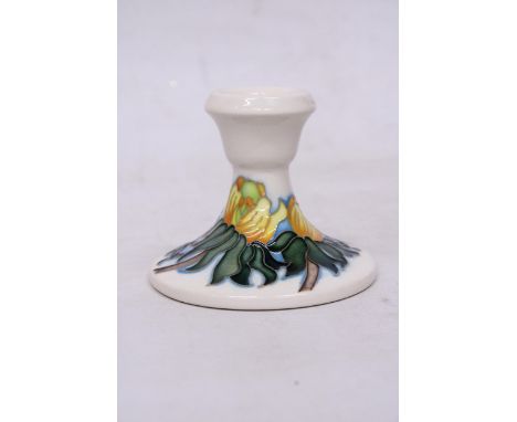 A MOORCROFT CANDLESTICK WINTER ACONITE PATTERN