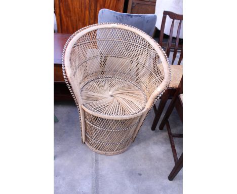 A VINTAGE WICKER PEACOCK CHAIR
