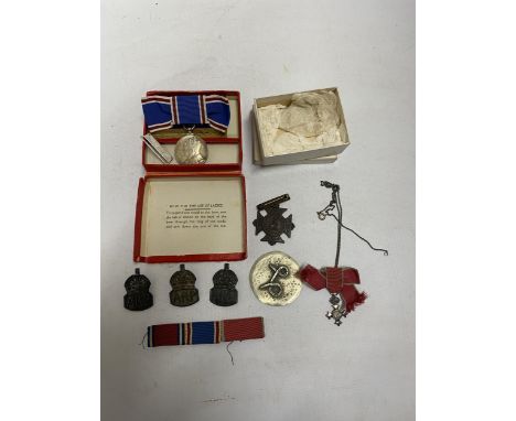 A BOXED GEORGE VI LADIES CORONATION MEDAL, THREE SILVER ARP BADGES, MINIATURE LADIES MBE MEDAL