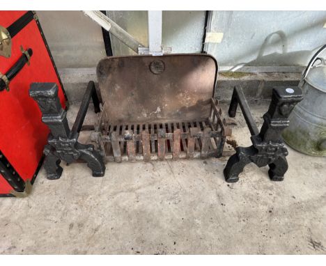 A VINTAGE FIRE GRATE WITH A PAIR OF FIRE DOGS