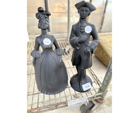 TWO BLACK CERAMIC FIGURES OF A LADY AND A GENTLEMAN FROM THE NAPOLEONIC ERA