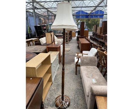 A MID 20TH CENTURY STANDARD LAMP WITH SHADE