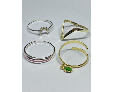 FOUR VARIOUS MARKED SILVER RINGS TO INCLUDE TWO GOLD PLATED