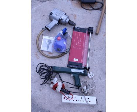 AN ASSORTMENT OF ITEMS TO INCLUDE AN IMPACT WRENCH AND A GILOTINE ETC