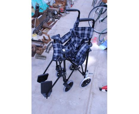 A POWERTREK FOUR WHEEL FOLDING WHEELCHAIR