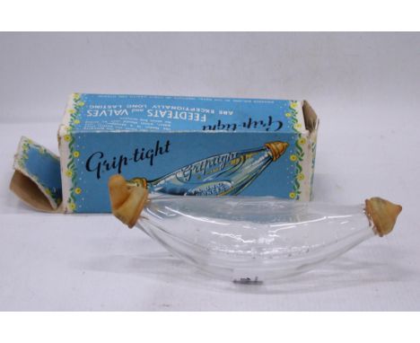 A VINTAGE BOXED, GRIP TIGHT, BANANA BOTTLE BABY FEEDER