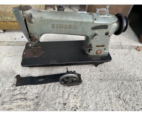 A VINTAGE SINGER SEWING MACHINE