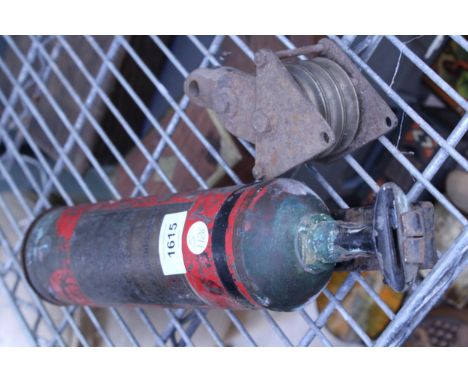 A VINTAGE FIRE EXTINGUISHER AND PULLEY