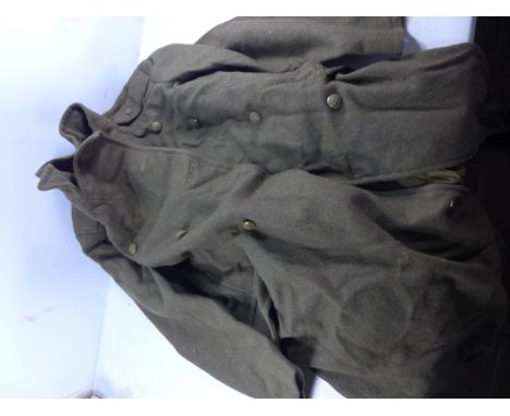 A WORLD WAR II ARMY GREATCOAT SIZE 7 DATED 1943