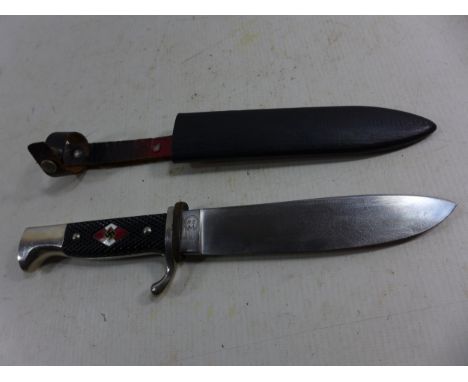 A KNIFE AND SCABBARD WITH 14CM BLADE, THE GRIP WITH ENAMEL DECORATION