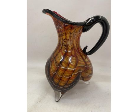 AN ITALIAN MIRHO HAND BLOWN MULTICOLOURED  FOOTED ART GLASS PITCHER