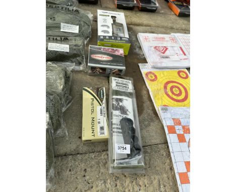 FOUR ITEMS TO INCLUDE A MODULAR PERSONAL LIGHTING SYSTEM, PISTOL MOUNT, SHOTSHELL CARRIER AND PISTOL MOUNT