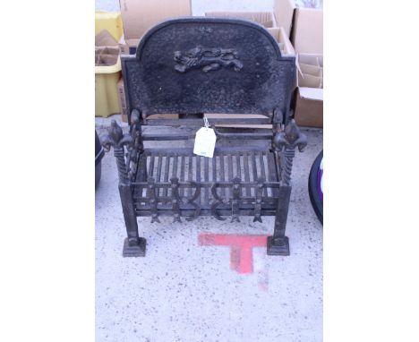 A DECORATIVE CAST IRON FIRE GRATE WITH BACK