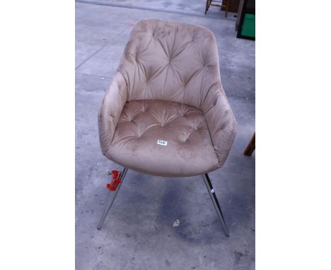 A BUTTON BACK BEDROOM CHAIR ON POLISHED CHROME LEGS