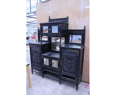 A 19TH CENTURY AESTHETIC MOVEMENT EBONIZED CHIFFONIER WITH SEVEN MIRRORS, FOLIATE CARVED DOORS AND ORNATE BRASS HINGES, ONE L