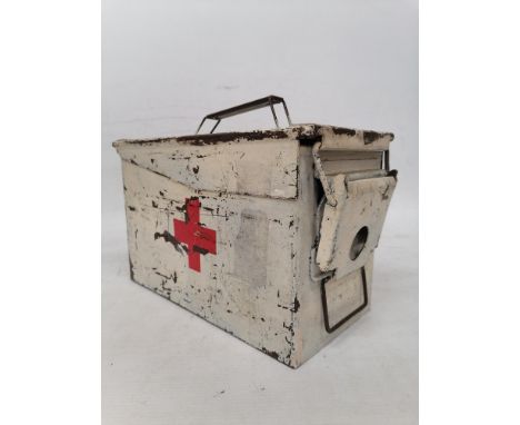 A VINTAGE PAINTED METAL MILITARY FIRST AID KIT WITH CONTENTS