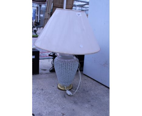 A DECORATIVE TABLE LAMP WITH SHADE