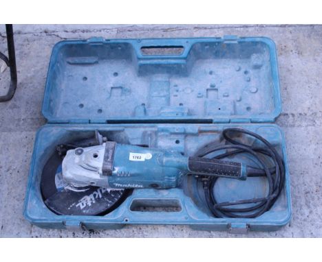 A CASED MAKITA ANGLE GRINDER