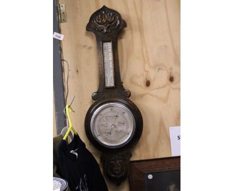 AN OAK BANJO BAROMETER