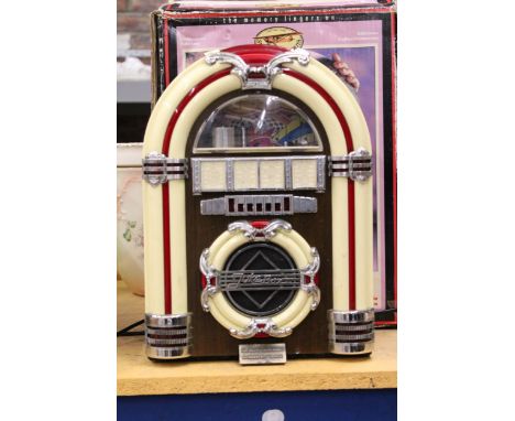 A RADIO AND CASSETTE TAPE 'JUKEBOX'