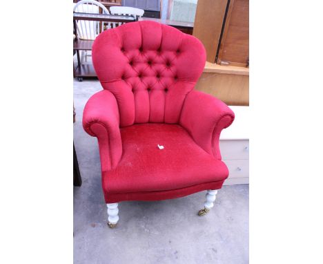 A VICTORIAN STYLE STUART JONES BUTTON-BACK LOUNGE CHAIR