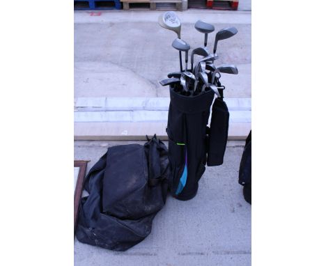 A GOLF BAG CONTAINING A SET OF DUNLOP GOLF CLUBS