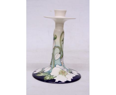 A MOORCROFT LENTEN HELLBORES CANDLESTICK HOLDER SIGNED BY KERRY GOODWIN