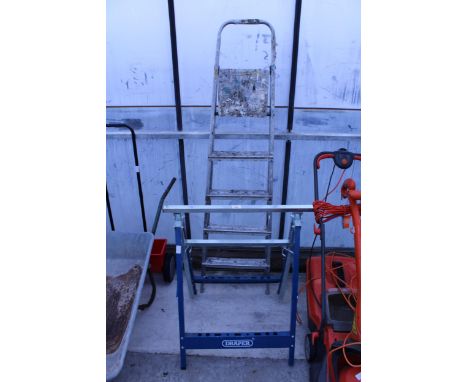 TWO ITEMS TO INCLUDE A DRAPER TRESTLE AND A PAIR OF FOUR RUNG ALUMINIUM STEP LADDERS