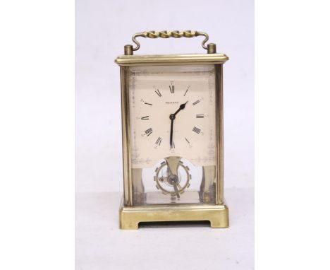 A VINTAGE GERMAN BRASS CARRIAGE CLOCK - VENDOR STATES IN WORKING ORDER, NO WARRANTY GIVEN